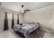 Bedroom featuring a ceiling fan and plenty of natural light at 6063 W Earll Dr, Phoenix, AZ 85033