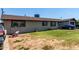 Modest single-story home with lawn, driveway and residential character at 6063 W Earll Dr, Phoenix, AZ 85033