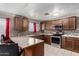 A kitchen with modern stainless steel appliances and plenty of counter space at 6063 W Earll Dr, Phoenix, AZ 85033
