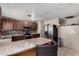Spacious kitchen featuring an island counter and stainless steel appliances at 6063 W Earll Dr, Phoenix, AZ 85033