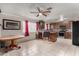 Eat-in kitchen with dark cabinets and stainless steel appliances at 6063 W Earll Dr, Phoenix, AZ 85033