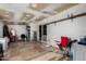 An open room houses laundry facilities with a sliding door to the backyard at 6063 W Earll Dr, Phoenix, AZ 85033