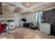 An open space houses laundry equipment with a sliding door to the yard at 6063 W Earll Dr, Phoenix, AZ 85033