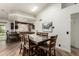 Bright dining area with glass top table, adjacent to updated kitchen, perfect for gatherings at 6232 N 88Th Ave, Glendale, AZ 85305