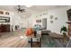 Bright and airy living room with wood floors, decor, and furniture at 6232 N 88Th Ave, Glendale, AZ 85305