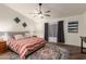 Comfortable main bedroom with ceiling fan and natural light, perfect for relaxation at 6232 N 88Th Ave, Glendale, AZ 85305