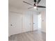 Bright and airy bedroom with new wood flooring and ample closet space, offering a serene retreat at 6544 N 7Th Ave # 14, Phoenix, AZ 85013