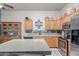 Spacious kitchen with stainless steel appliances and ample cabinet storage at 6610 E University Dr # 2, Mesa, AZ 85205