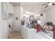 Inviting living room with neutral walls, recessed lighting, and an open concept to the kitchen at 6610 E University Dr # 2, Mesa, AZ 85205