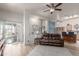Open-concept living room with a view of the kitchen at 6610 E University Dr # 2, Mesa, AZ 85205