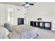 Bedroom with plush neutral carpet, natural light, and tasteful decor, creating a serene and inviting atmosphere at 7532 E Sierra Morena Cir, Mesa, AZ 85207