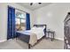 Cozy bedroom with large window providing ample light at 7532 E Sierra Morena Cir, Mesa, AZ 85207