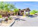 Spa & Fitness Center entrance with mature trees and accessible parking spots at 7532 E Sierra Morena Cir, Mesa, AZ 85207