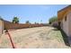 Large backyard featuring mature landscaping, a block wall, and ample space for creating an outdoor oasis at 7549 W Yucca St, Peoria, AZ 85345