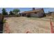 Spacious backyard showcasing a covered patio, block wall, and room for landscaping and outdoor living at 7549 W Yucca St, Peoria, AZ 85345