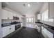 Bright kitchen showcasing sleek countertops, stainless steel appliances, and ample storage at 7549 W Yucca St, Peoria, AZ 85345