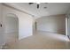 Bright living room featuring tile flooring and access to the outdoor patio at 7549 W Yucca St, Peoria, AZ 85345