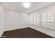 Versatile bonus room with plantation shutters, and wood floors perfect for an office, or studio space at 8007 E Del Tesoro Dr, Scottsdale, AZ 85258