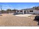 This home features a large backyard with gravel, a patio with seating, and privacy at 8022 E Columbus Ave, Scottsdale, AZ 85251