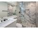 Elegant bathroom with marble tile shower and modern fixtures at 8022 E Columbus Ave, Scottsdale, AZ 85251