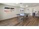Spacious game room features a ping pong table and modern flooring at 8022 E Columbus Ave, Scottsdale, AZ 85251