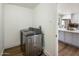 Convenient laundry room with modern appliances and stylish flooring at 8022 E Columbus Ave, Scottsdale, AZ 85251