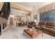 Open concept living and dining area, complete with plush seating and stylish decor at 8324 E Cactus Wren Rd, Scottsdale, AZ 85250