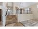 Elegant entryway with tile flooring, wrought iron railing and staircase, seamlessly blends style and functionality at 8621 W Morten Ave, Glendale, AZ 85305