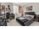 Bedroom featuring a bed, desk, and decor at 8735 N 185Th Ave, Waddell, AZ 85355