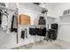 Walk-in closet with ample storage space, shelving, and hanging rods for organization at 8735 N 185Th Ave, Waddell, AZ 85355