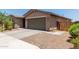 Well maintained single story home with a two car garage, low maintenance landscaping and paved drive at 8735 N 185Th Ave, Waddell, AZ 85355