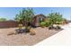 Well-maintained side yard, featuring low-maintenance landscaping and desert-friendly plants at 8735 N 185Th Ave, Waddell, AZ 85355