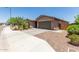 Well maintained single story home with a two car garage, low maintenance landscaping and paved drive at 8735 N 185Th Ave, Waddell, AZ 85355