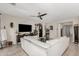 Comfortable living room with modern decor, a ceiling fan, and plenty of natural light at 8735 N 185Th Ave, Waddell, AZ 85355