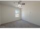 Bedroom with carpet, neutral walls, and a closet with sliding doors at 890 N Bogle Ct, Chandler, AZ 85225