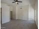 A neutral Primary bedroom offers a ceiling fan and natural light at 890 N Bogle Ct, Chandler, AZ 85225
