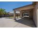 Covered patio with ceiling fan, sliding glass doors, and views of the backyard at 890 N Bogle Ct, Chandler, AZ 85225