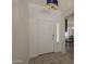 Bright entryway featuring tiled flooring, a front door with sidelight, and dining room view at 890 N Bogle Ct, Chandler, AZ 85225