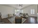 Bright living area with patio doors, plush seating, ceiling fan, and contemporary decor at 890 N Bogle Ct, Chandler, AZ 85225