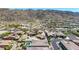 Scenic aerial shot showcasing a charming neighborhood nestled against the mountains at 9029 S 15Th St, Phoenix, AZ 85042