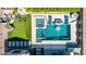 Aerial view of a luxurious backyard featuring a pool, spa, and outdoor living spaces at 9029 S 15Th St, Phoenix, AZ 85042