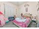 Charming pink bedroom with a Princess theme is perfect for children at 9029 S 15Th St, Phoenix, AZ 85042