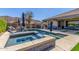 Stunning pool and spa with mountain views, creating a serene backyard oasis at 9029 S 15Th St, Phoenix, AZ 85042