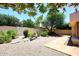 Low maintenance desert landscaping in backyard area at 9235 N 101St St, Scottsdale, AZ 85258