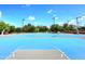 Outdoor basketball court featuring professional lines and lighting at 9235 N 101St St, Scottsdale, AZ 85258