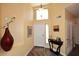 Inviting entryway with high ceilings and wood-like floors at 9235 N 101St St, Scottsdale, AZ 85258