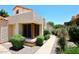 Charming home with orange tile roof and manicured landscaping at 9235 N 101St St, Scottsdale, AZ 85258