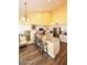 Bright kitchen with granite countertops, stainless steel appliances and island with seating at 9235 N 101St St, Scottsdale, AZ 85258