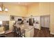 Bright kitchen with granite countertops, stainless steel appliances and island with seating at 9235 N 101St St, Scottsdale, AZ 85258