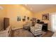 Cozy sitting room featuring vaulted ceilings and plenty of natural light at 9235 N 101St St, Scottsdale, AZ 85258